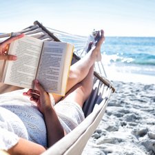 Brunette reading a book 