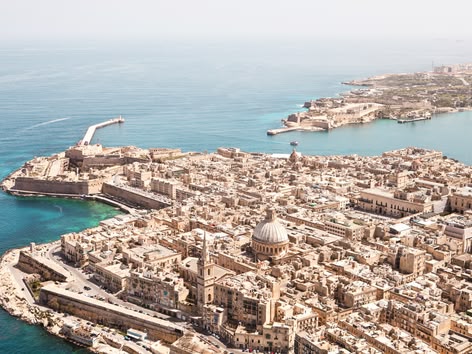 Detailed aerial view of Valletta with its dome and narrow historic streets.