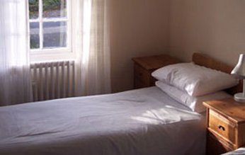 Sypialnia w apartamencie w Londonie